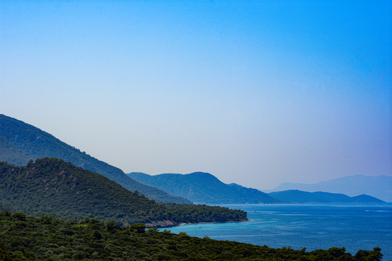 Breathtaking view of the beautiful mountains and coastline in Güzelçamlı, Türkiye.